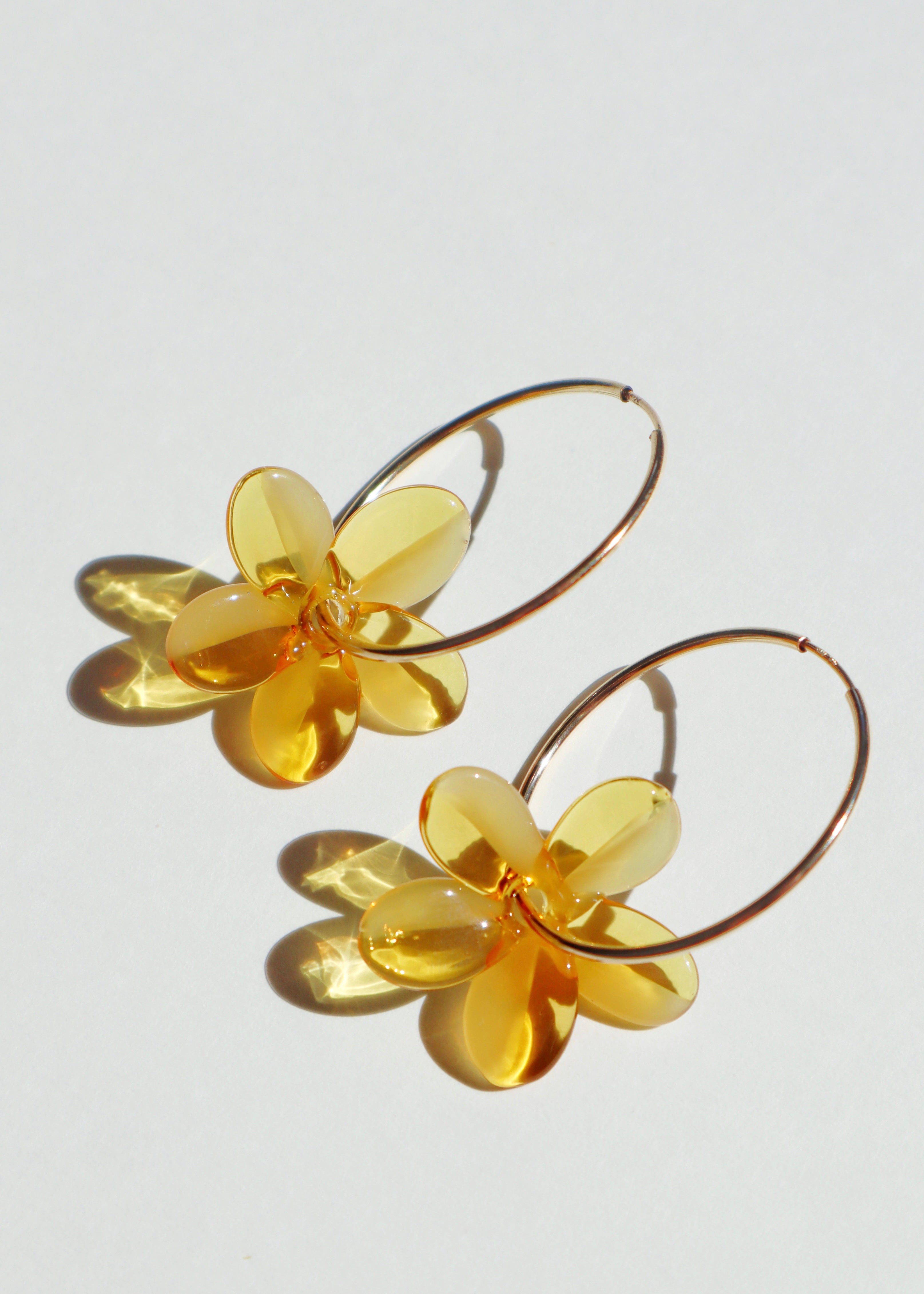 yellow glass plumeria hoop earrings