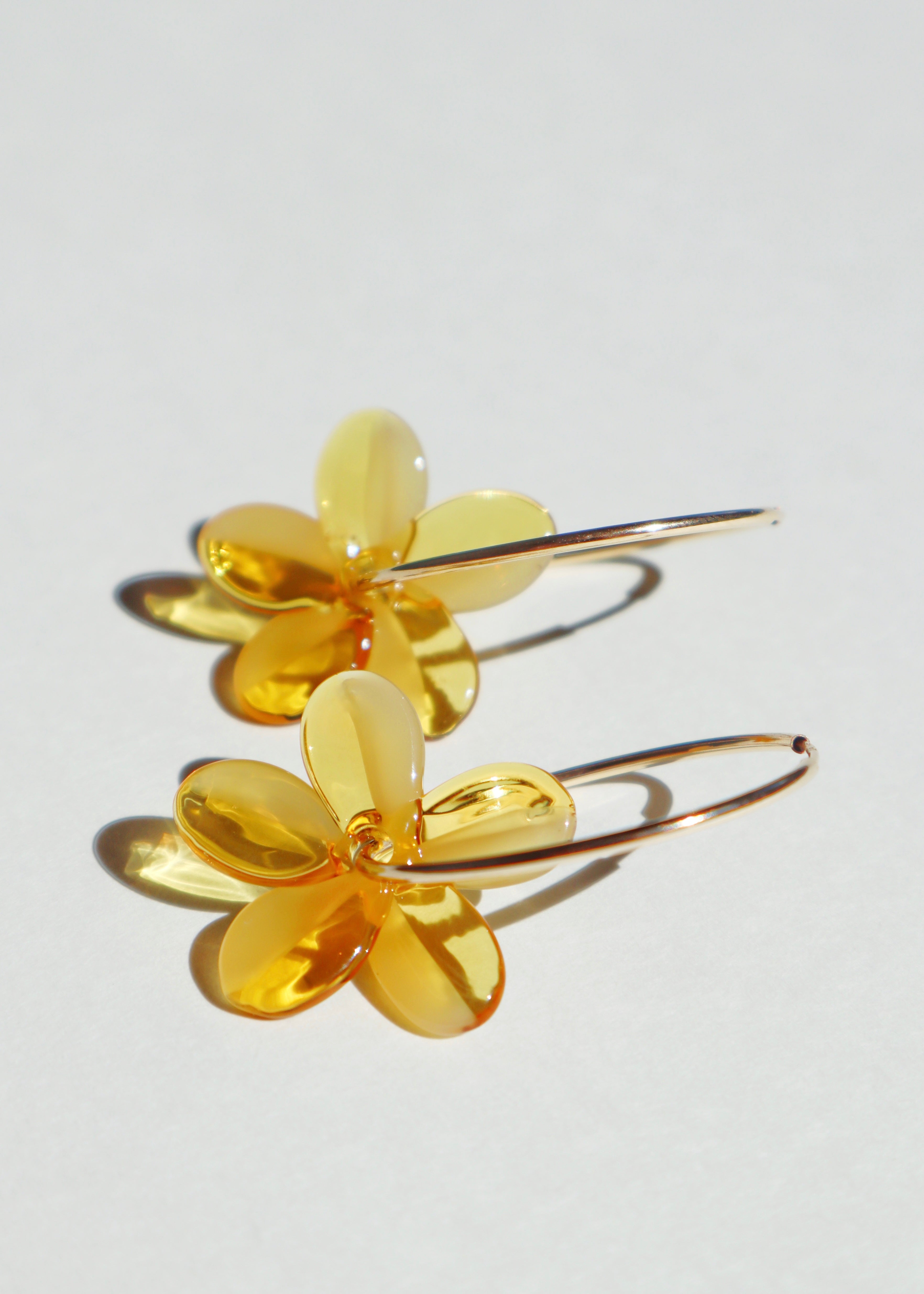 yellow glass plumeria hoop earrings