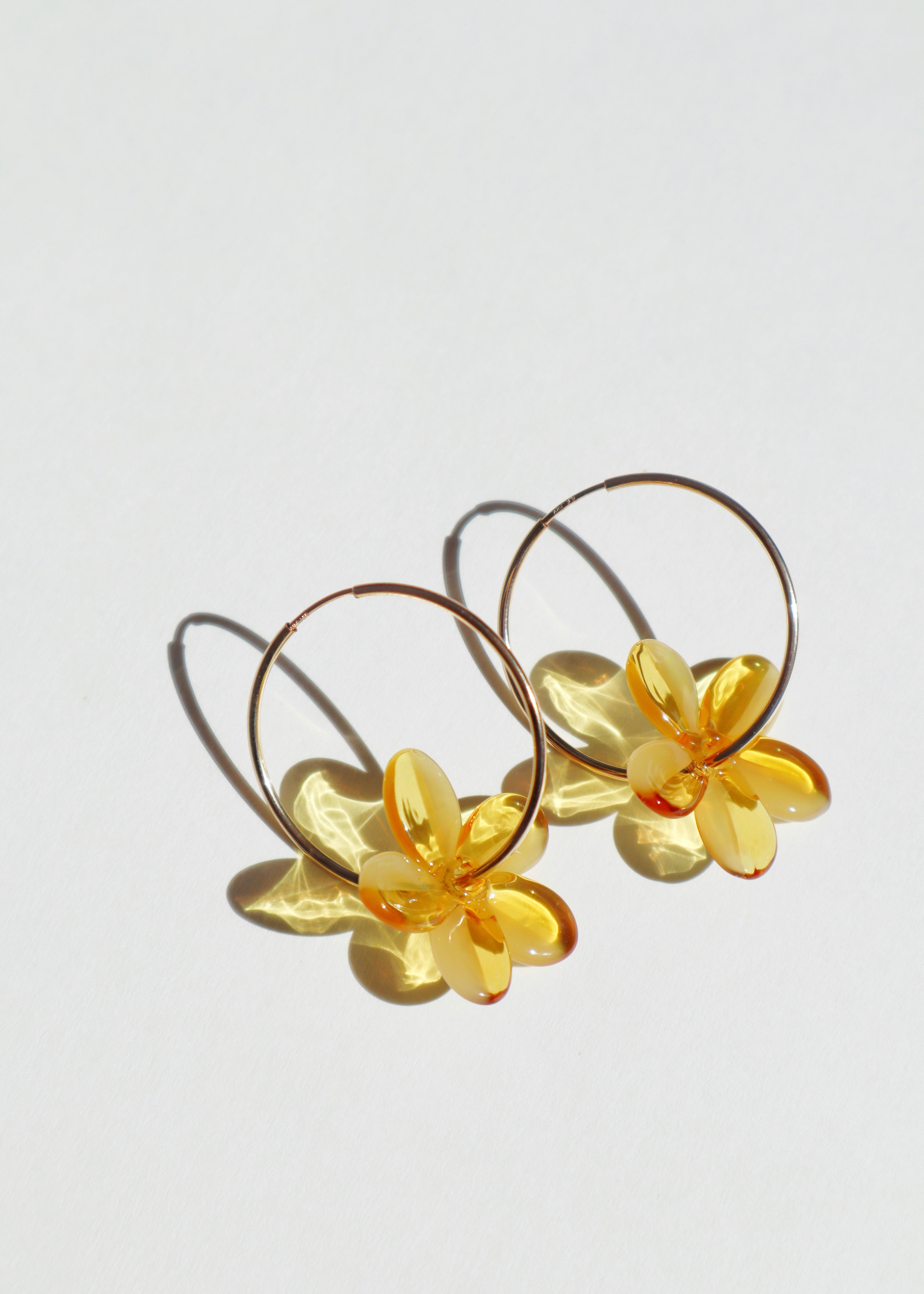 yellow glass plumeria hoop earrings