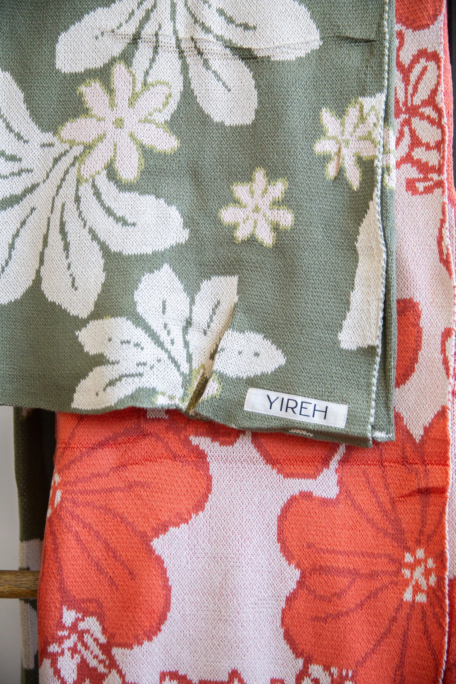green cotton throw blanket with naupaka print