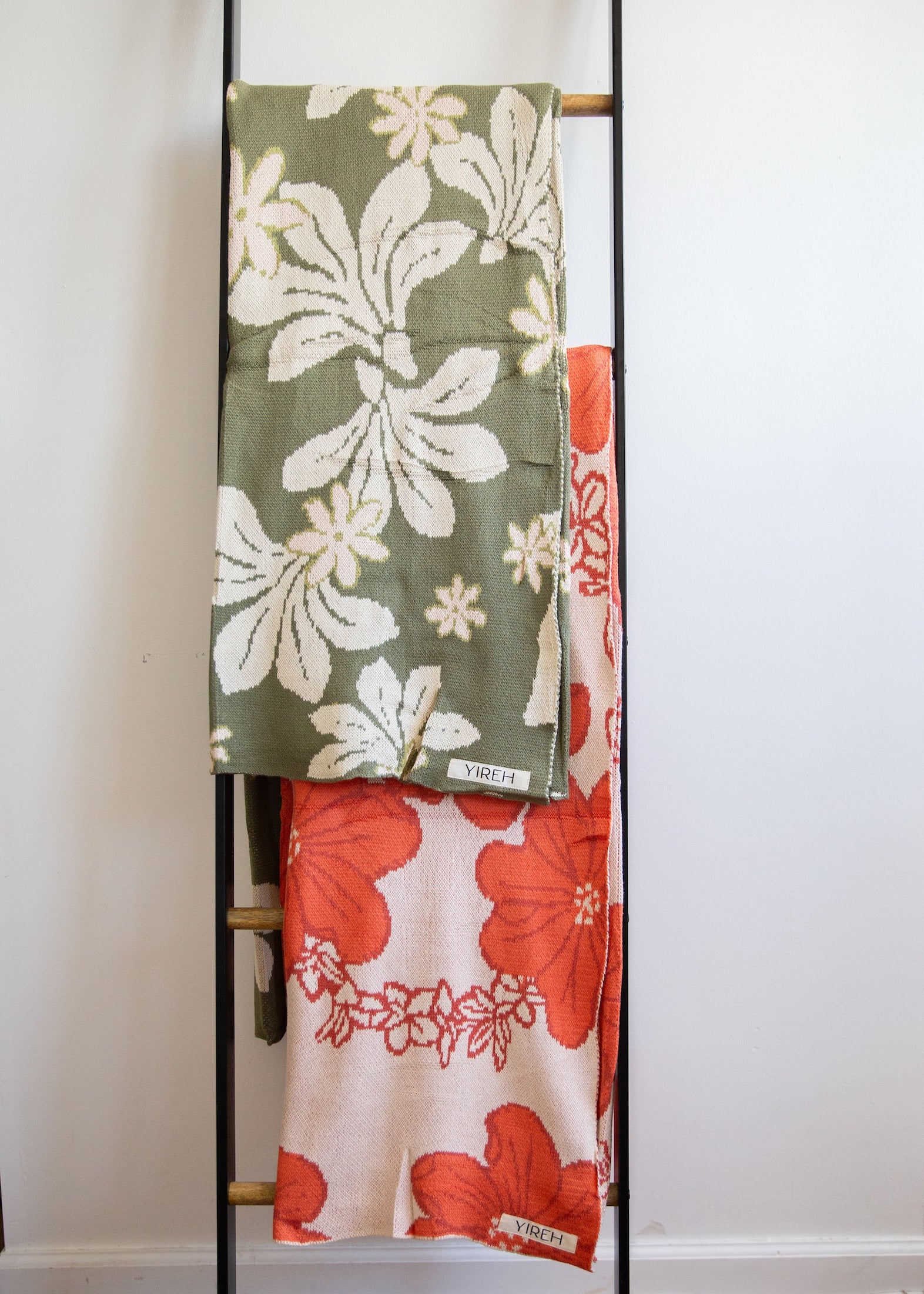 green cotton throw blanket with naupaka print