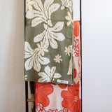 orange cotton throw blanket with floral print