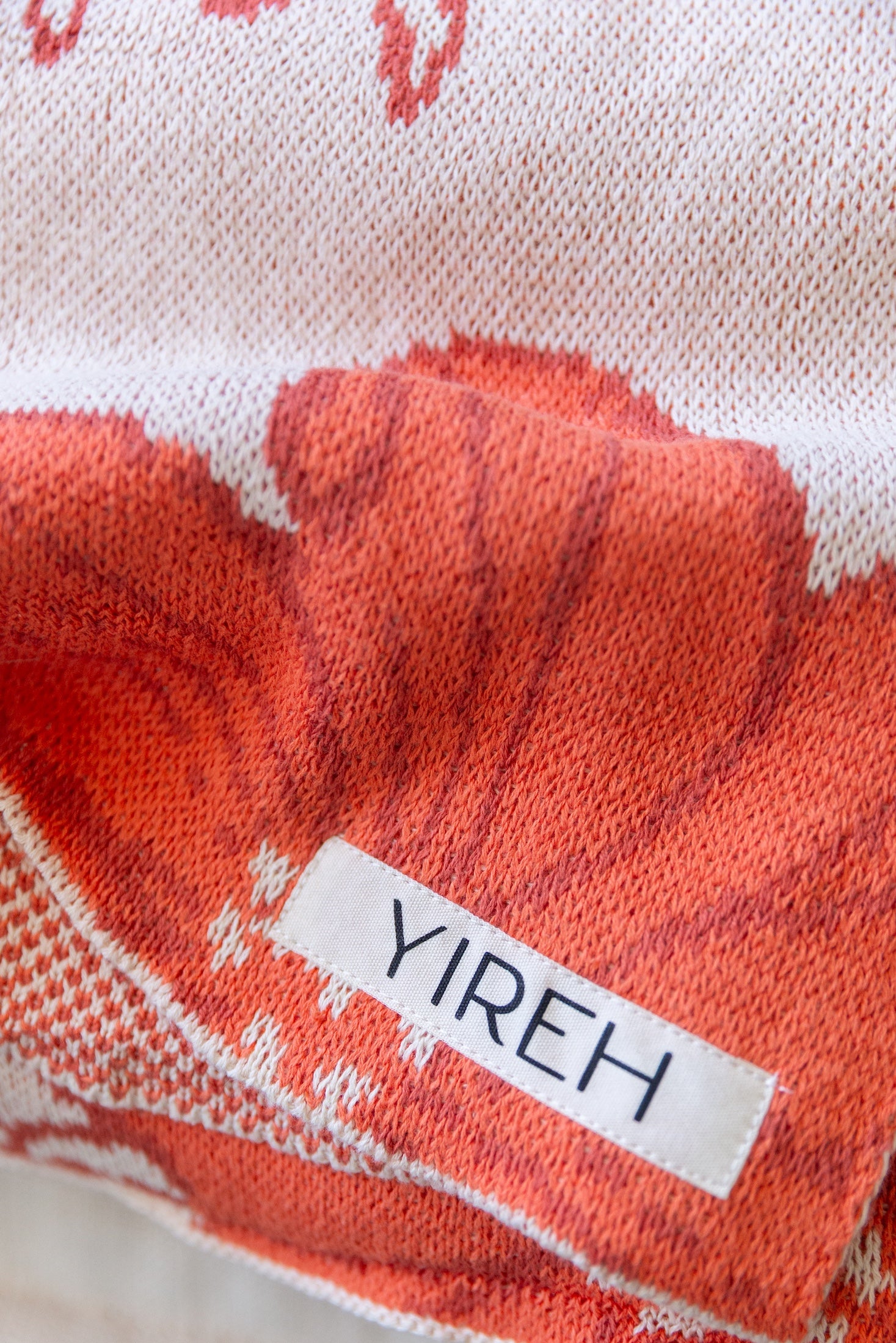 orange cotton throw blanket with floral print