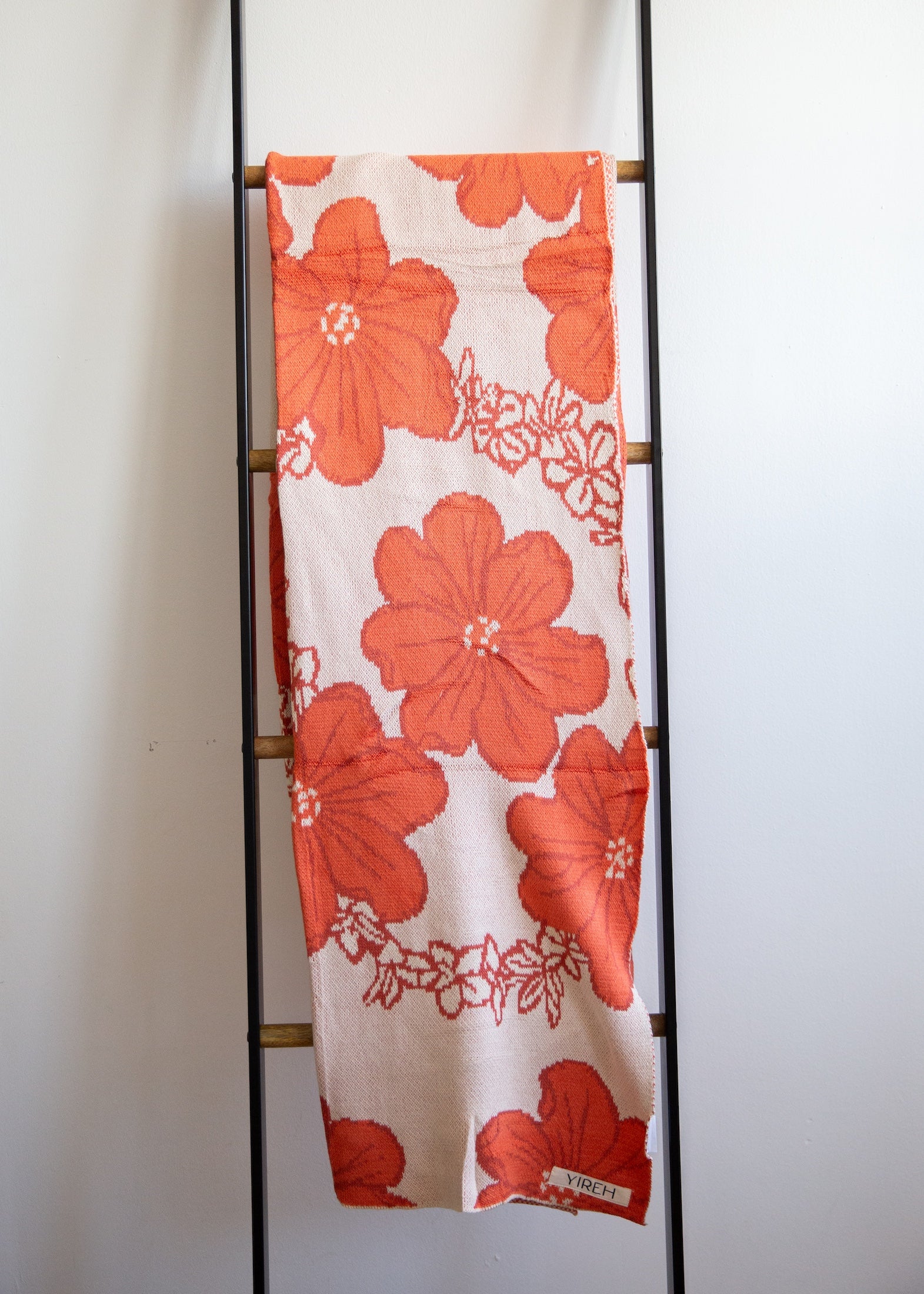 orange cotton throw blanket with floral print