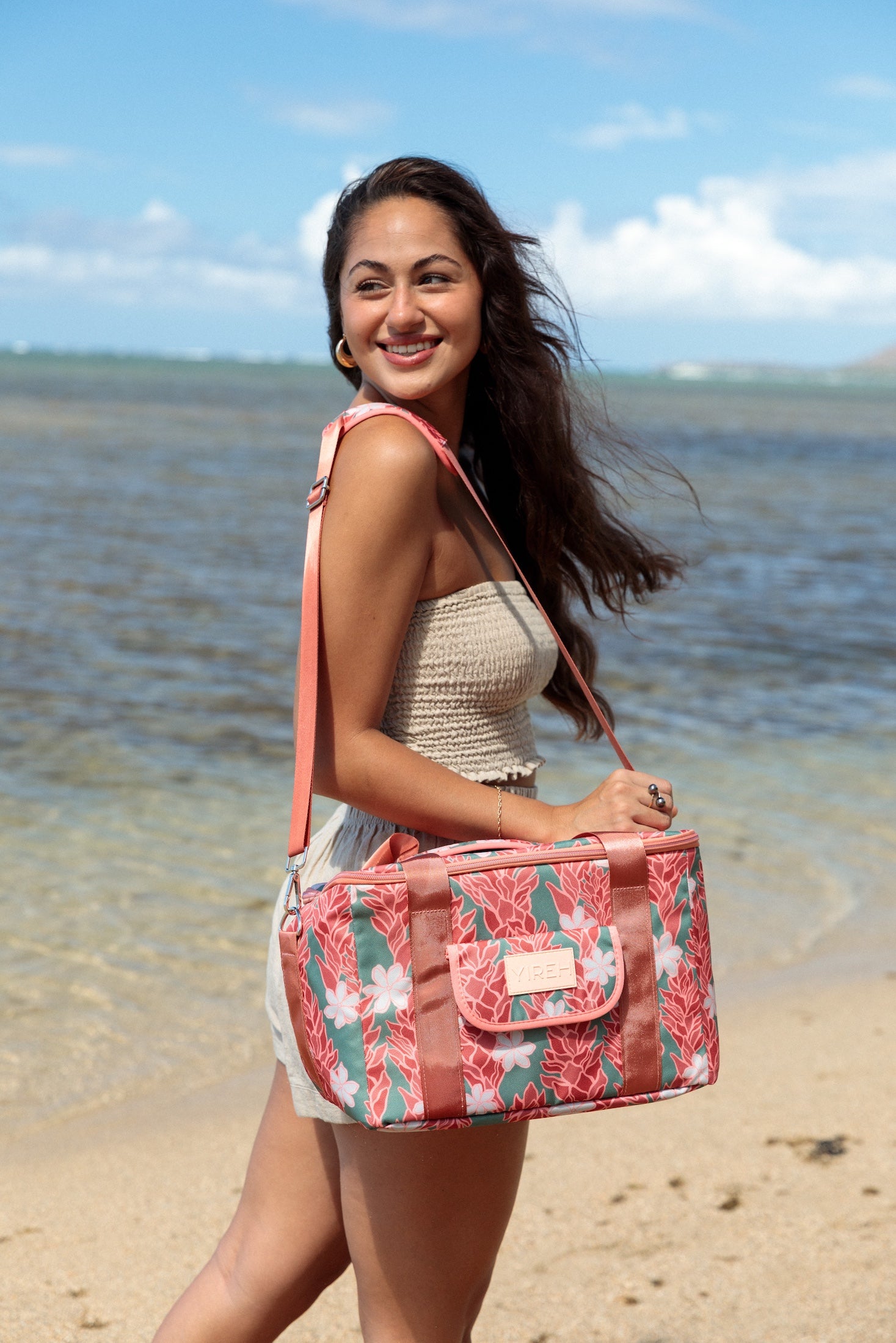 green cooler bag with tiare and red ginger floral pattern