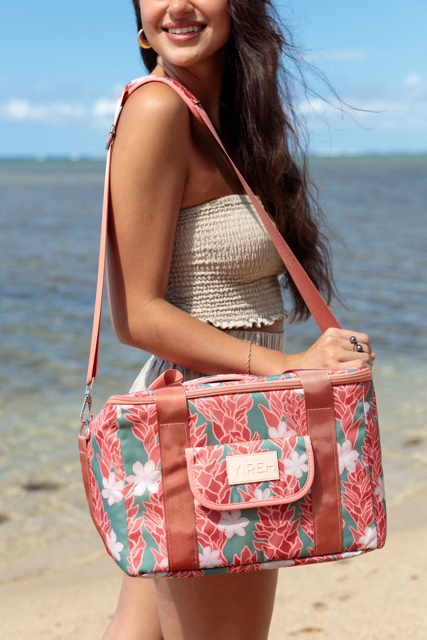 green cooler bag with tiare and red ginger floral pattern