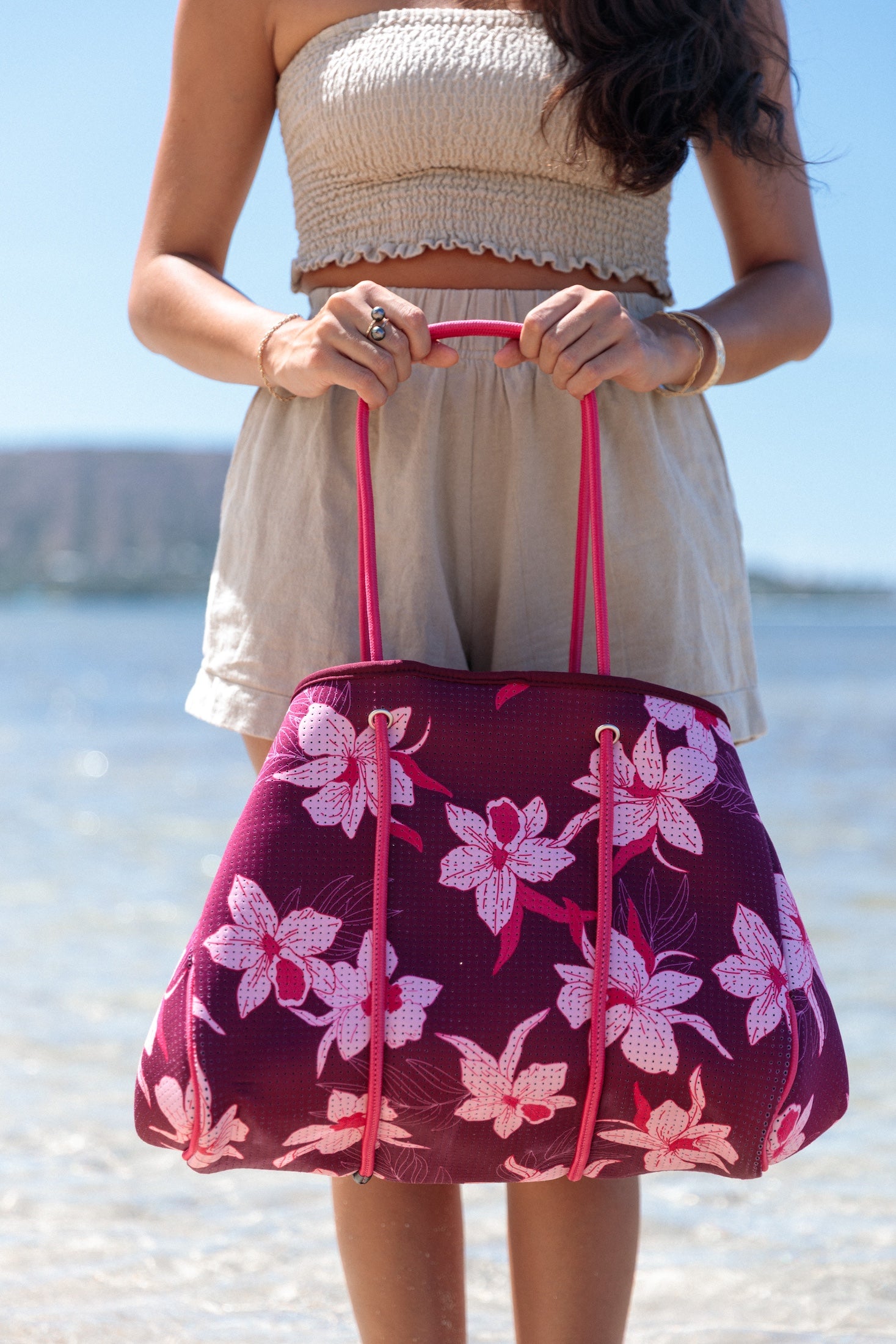 large dark purple neoprene tote bag with orchid pattern