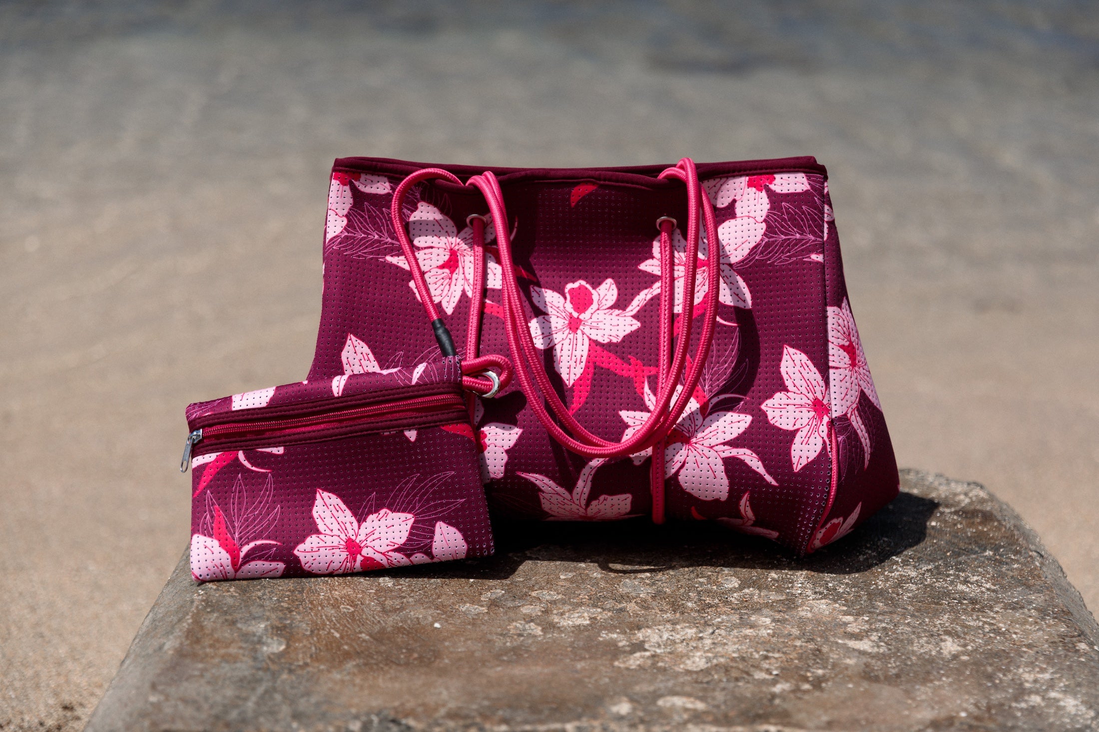 large dark purple neoprene tote bag with orchid pattern