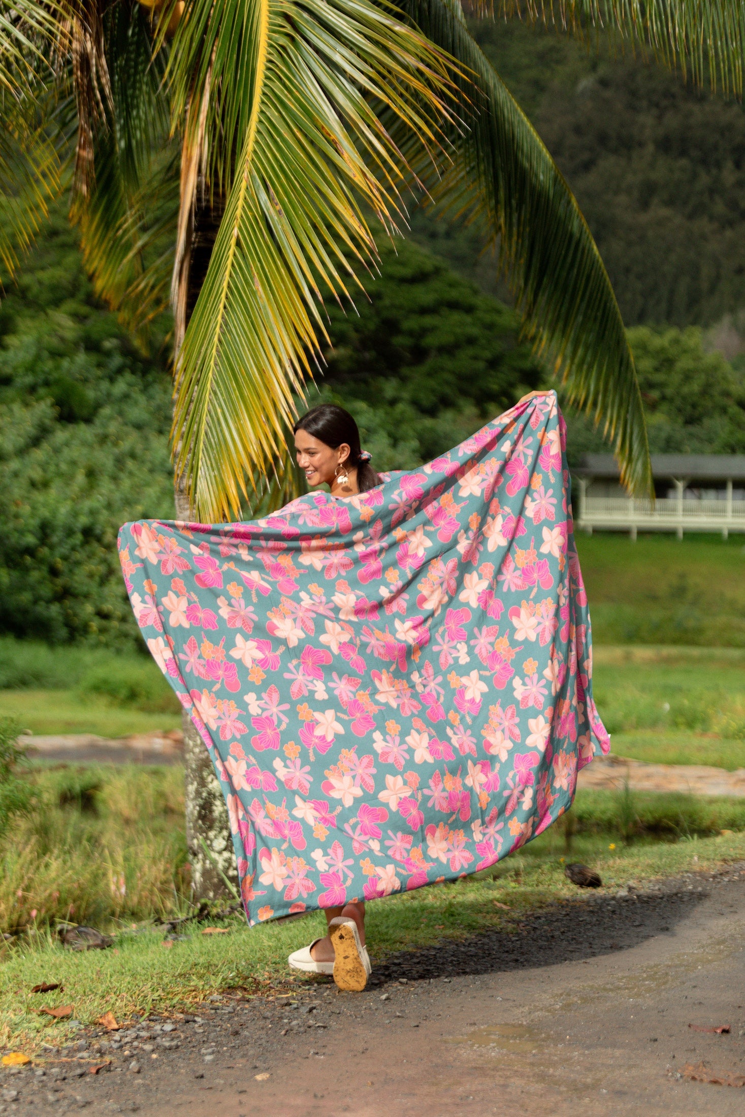 teal pareo with floral pattern