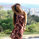 woman wearing pareo with awapuhi print