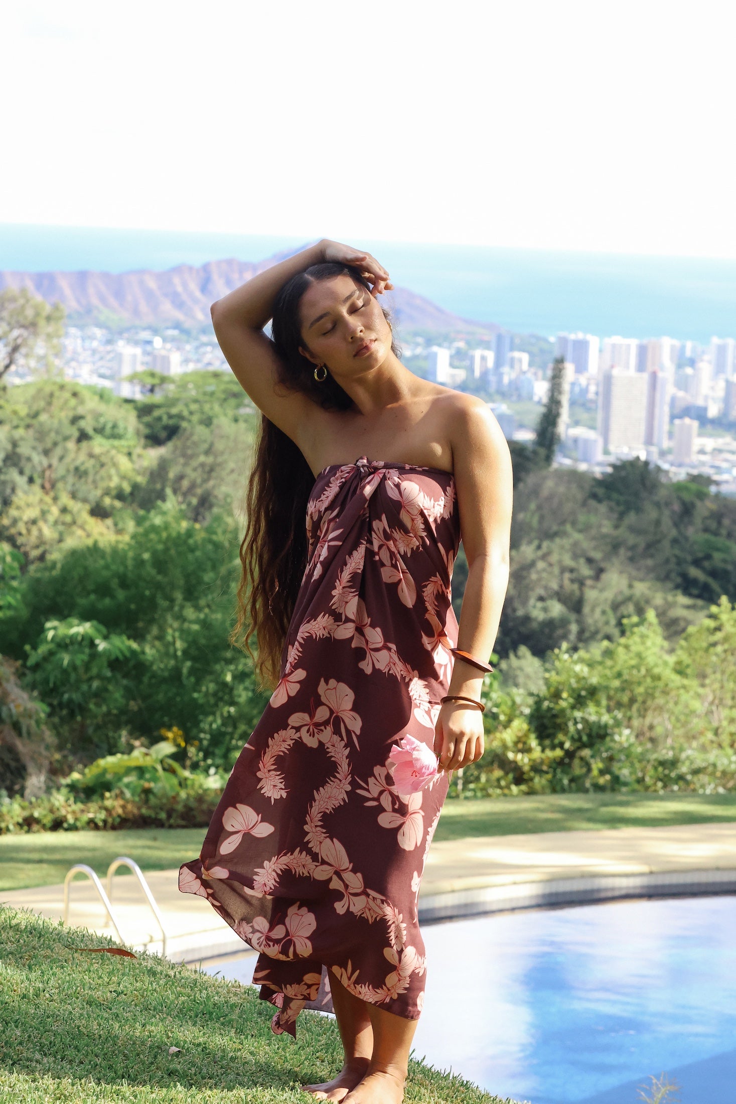 woman wearing pareo with awapuhi print