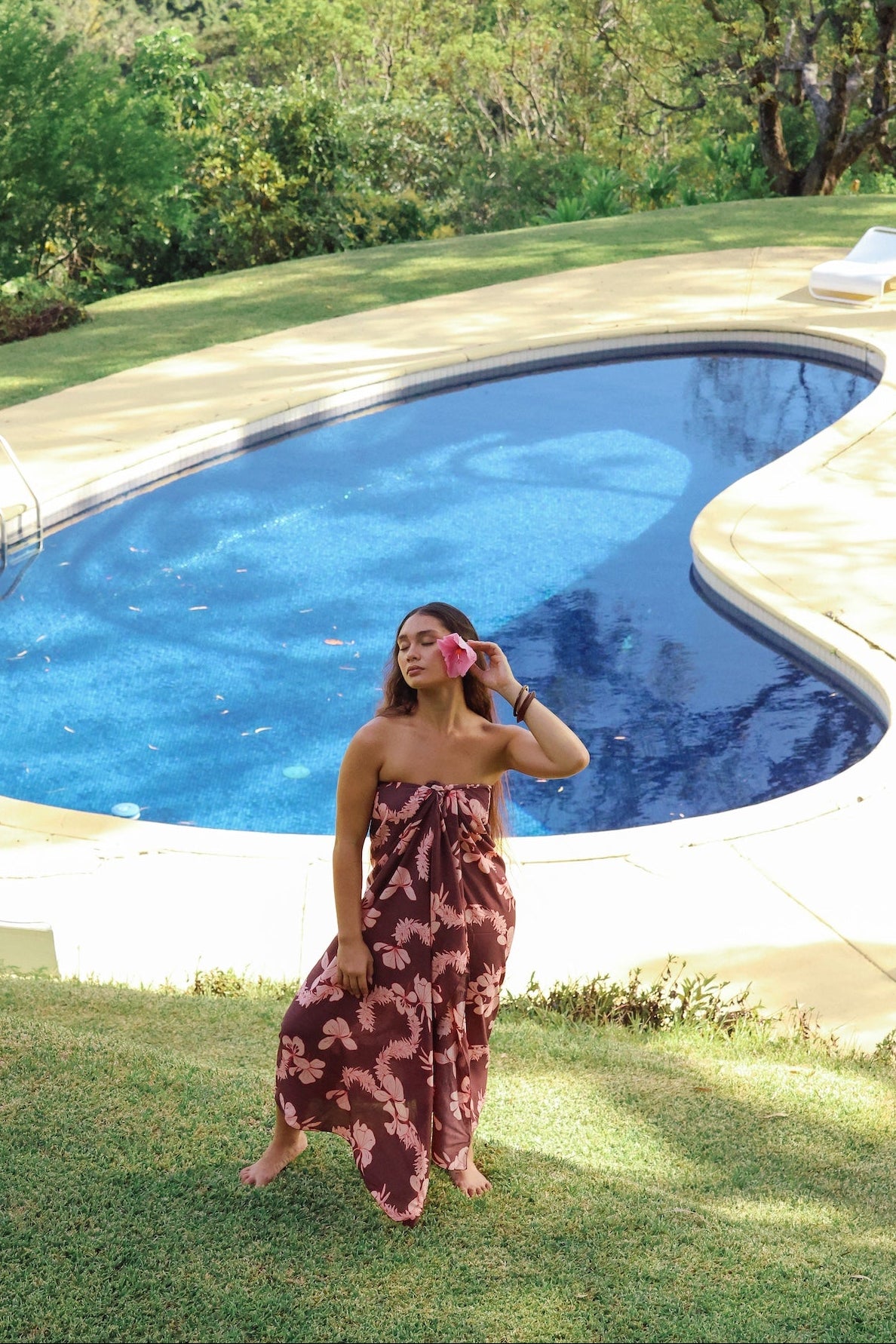 woman wearing pareo with awapuhi print