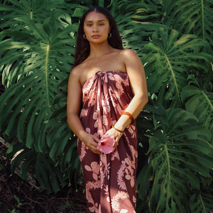 woman wearing pareo with awapuhi print
