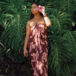 woman wearing pareo with awapuhi print