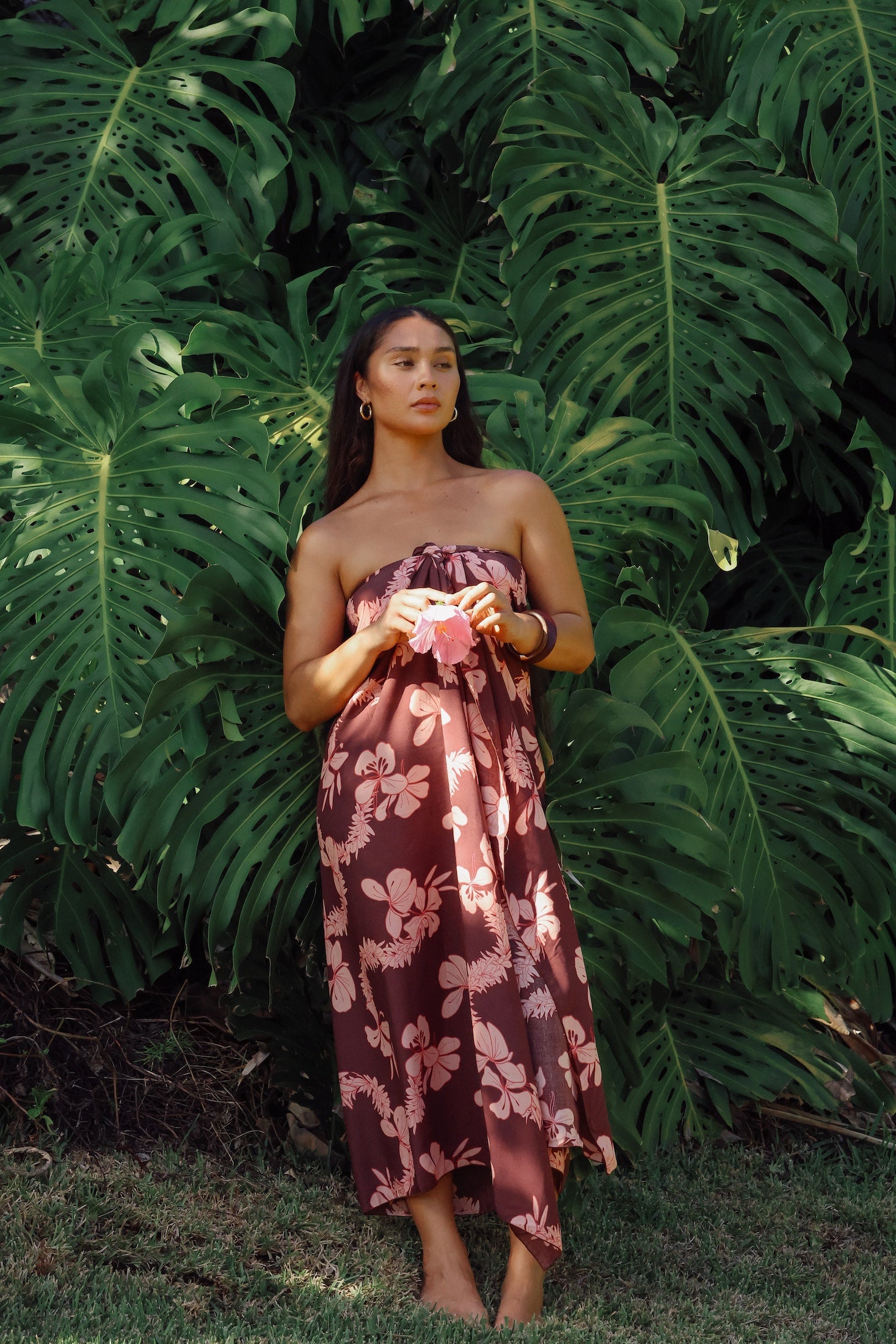 woman wearing pareo with awapuhi print