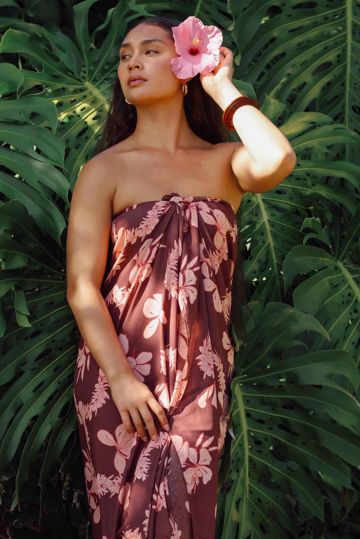 woman wearing pareo with awapuhi print