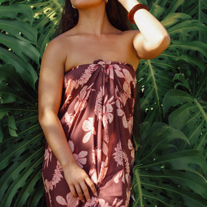 woman wearing pareo with awapuhi print