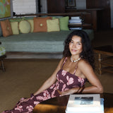 woman wearing brown bandeau with light pink lei awapuhi print