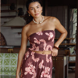 woman wearing brown bandeau with light pink lei awapuhi print
