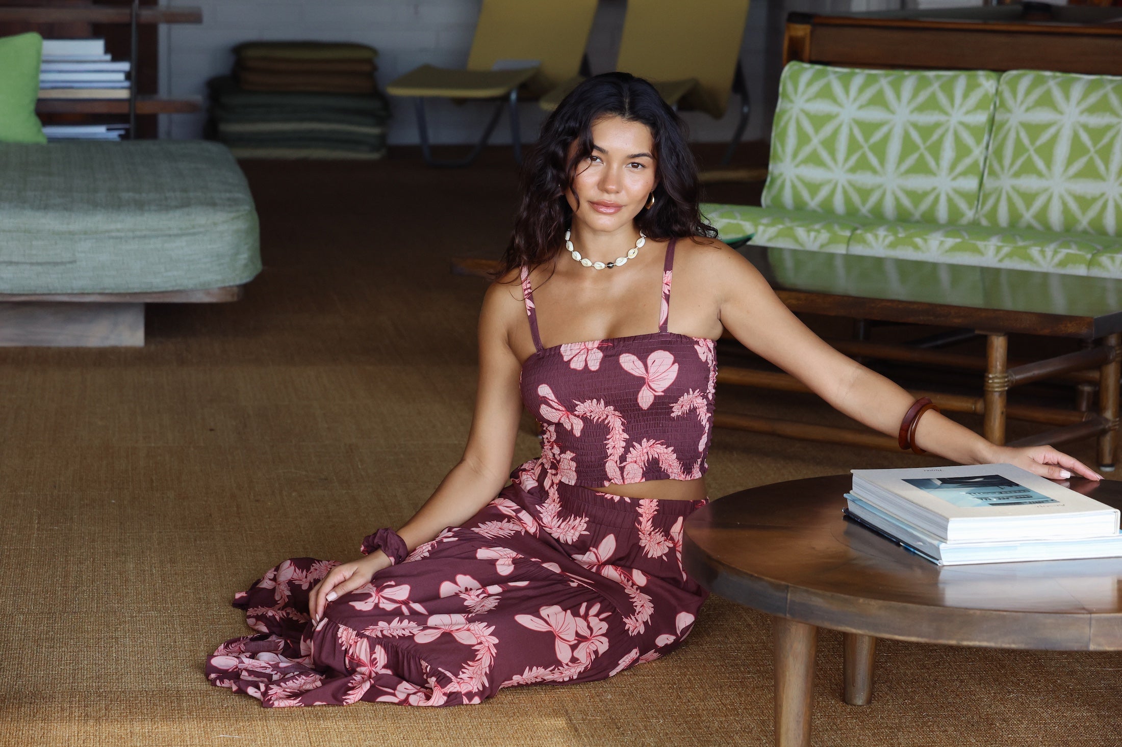 woman wearing brown bandeau with light pink lei awapuhi print