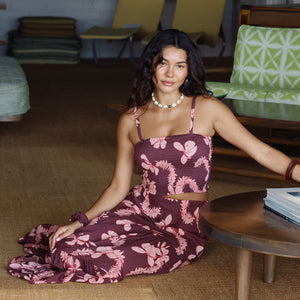 woman wearing brown bandeau with light pink lei awapuhi print