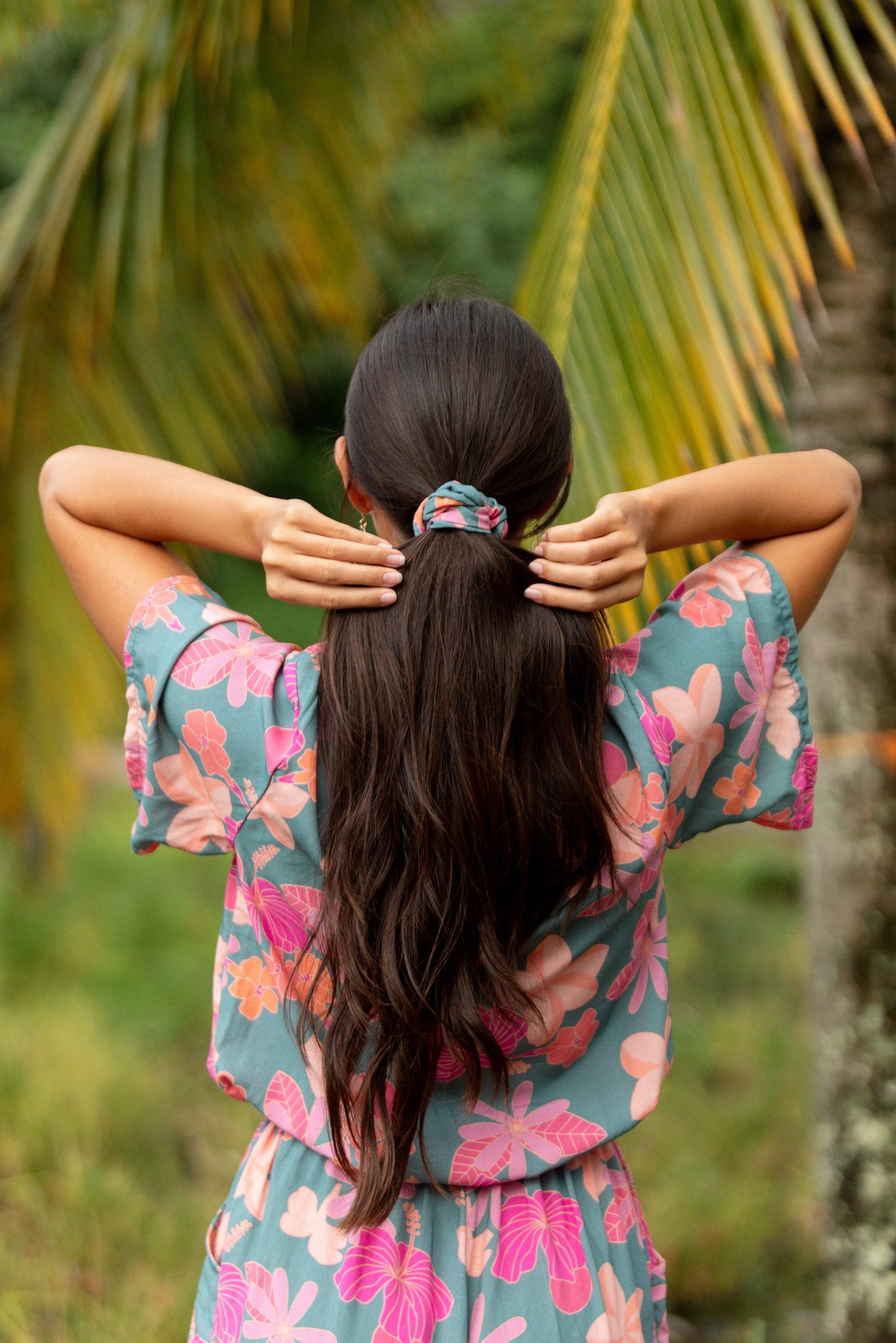woman wearing scrunchie in floral pattern