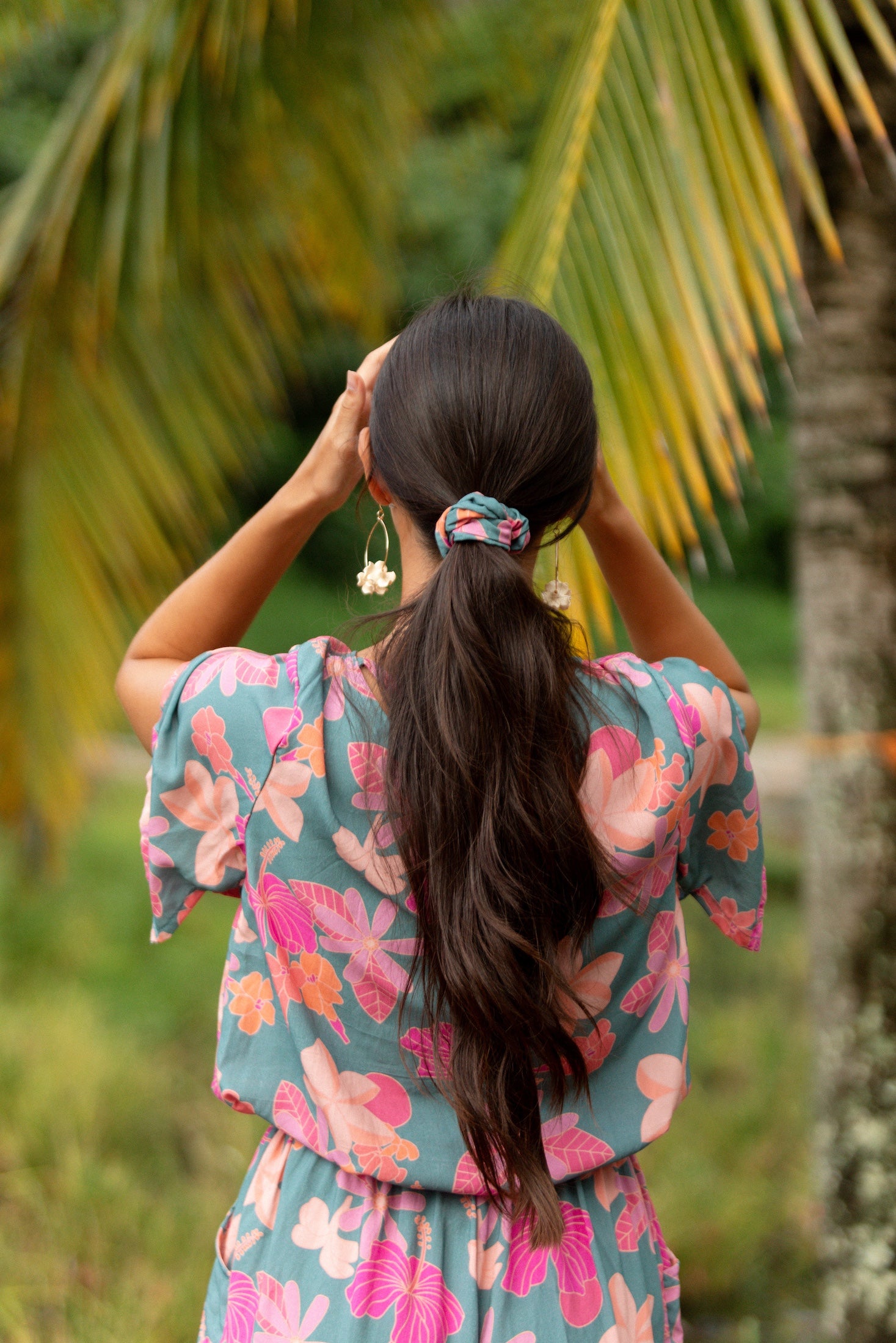 woman wearing scrunchie in floral pattern