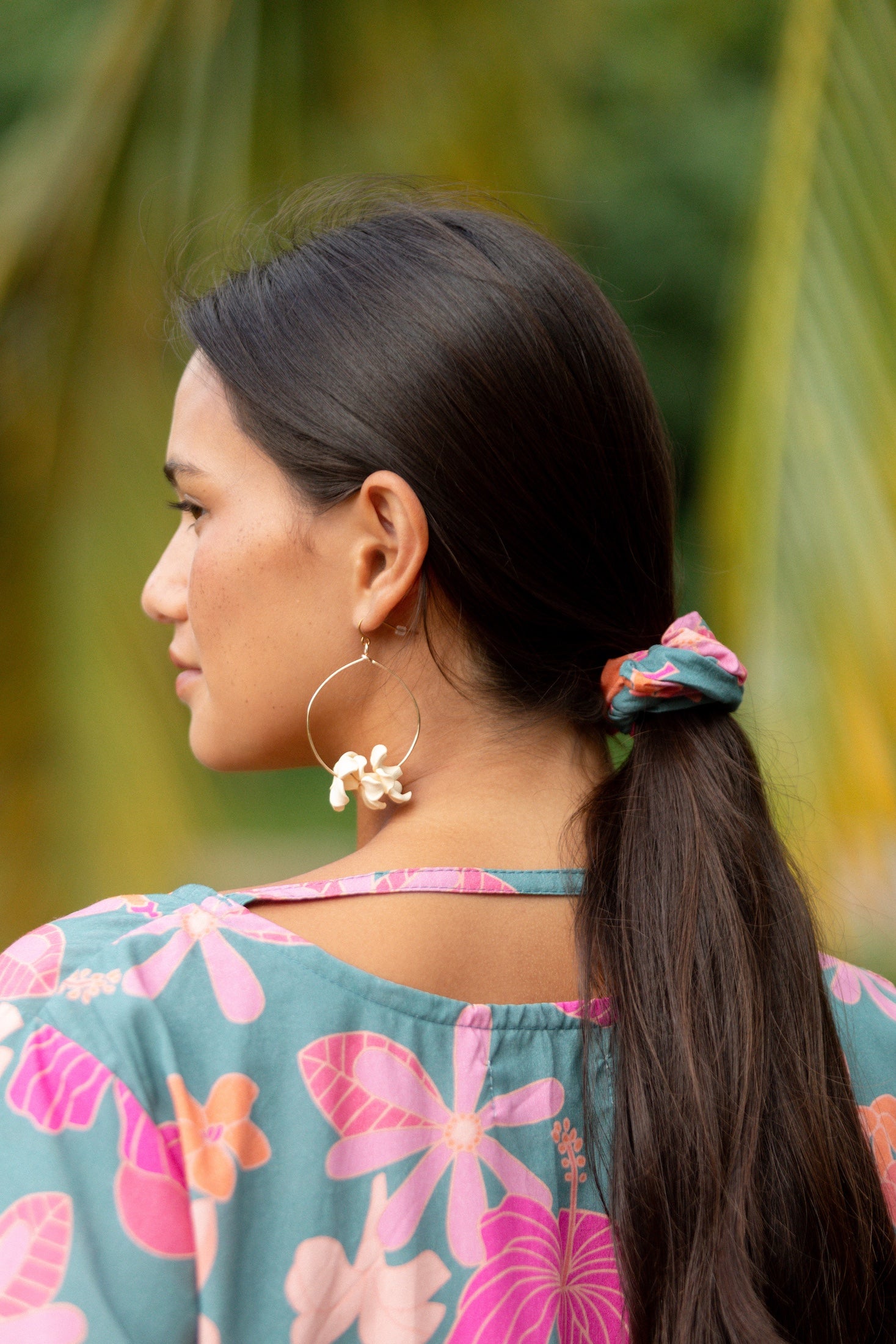 woman wearing scrunchie in floral pattern