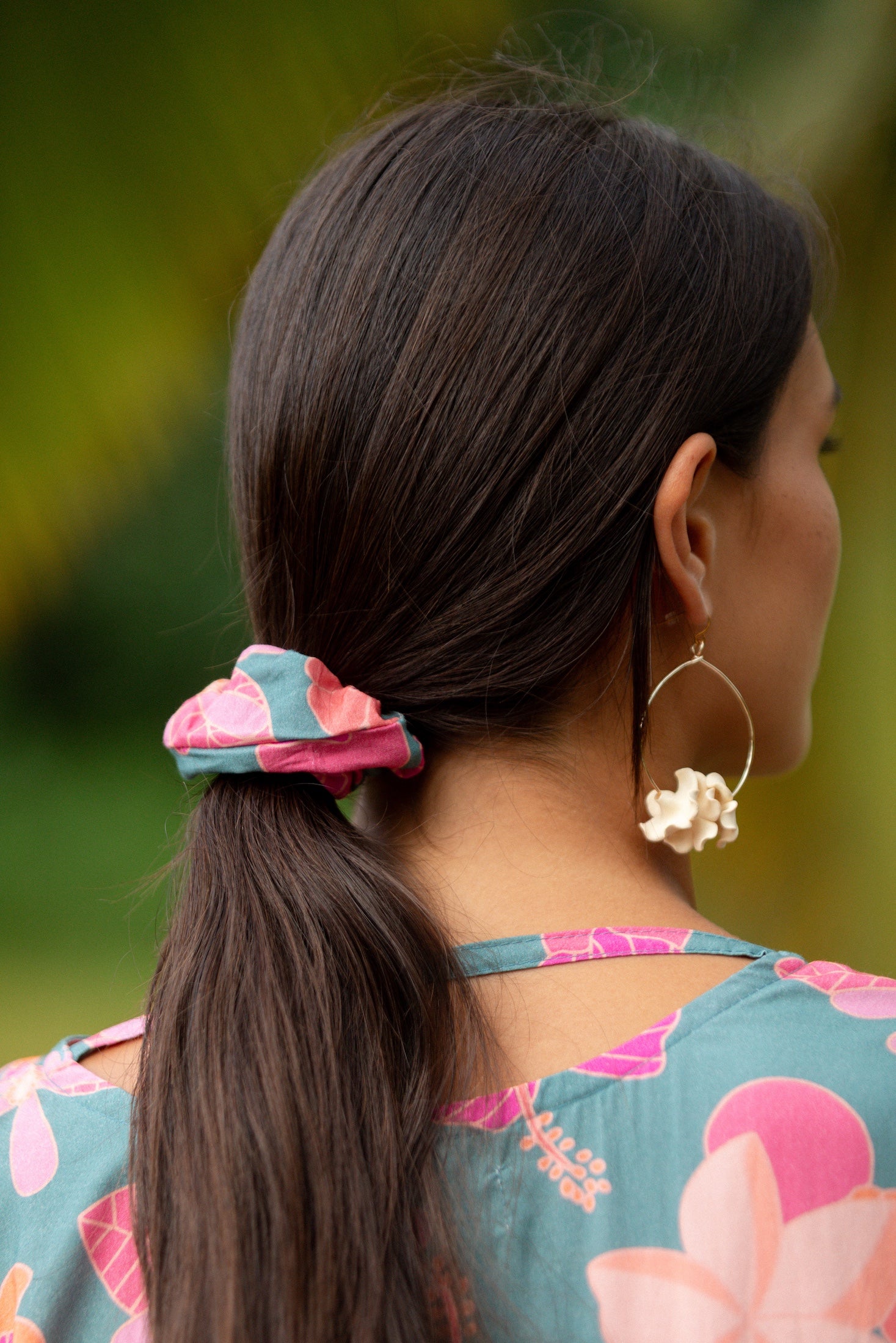 woman wearing scrunchie in floral pattern