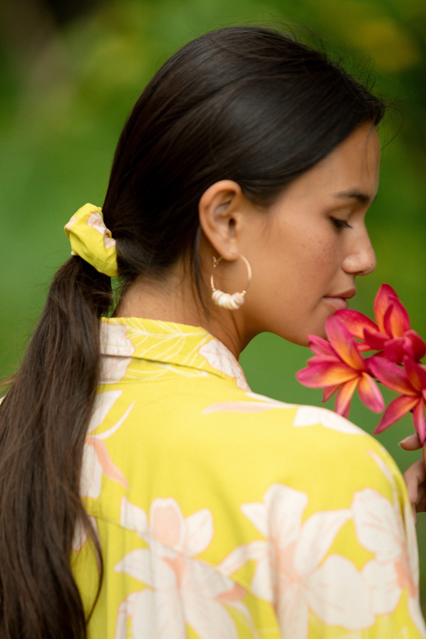 woman wearing scrunchie in bright orchid pattern