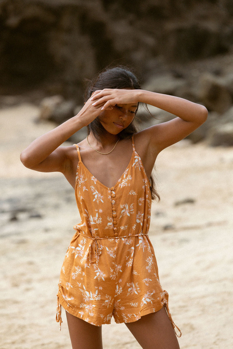 YIREH Hudson Romper in Spice - a flirty romper with covered buttons, adjustable straps, and a tie belt. Versatile resortwear ethically and sustainably made with exclusive and one of a kind prints.