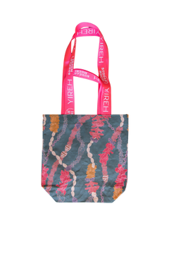 buddah mochi manini bag in lei stand