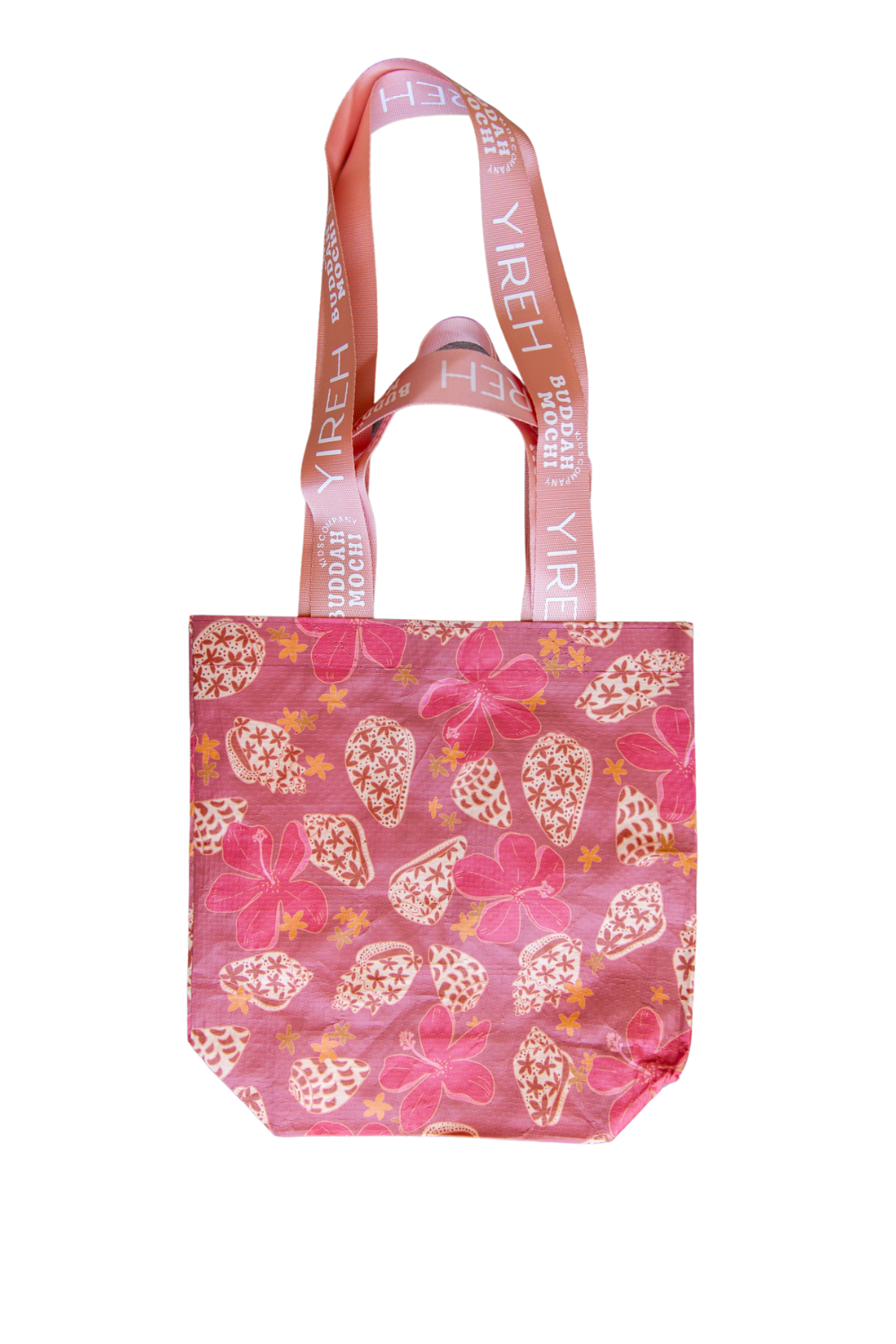 pink buddah mochi manini bag with shell & pua print with light pink straps. 