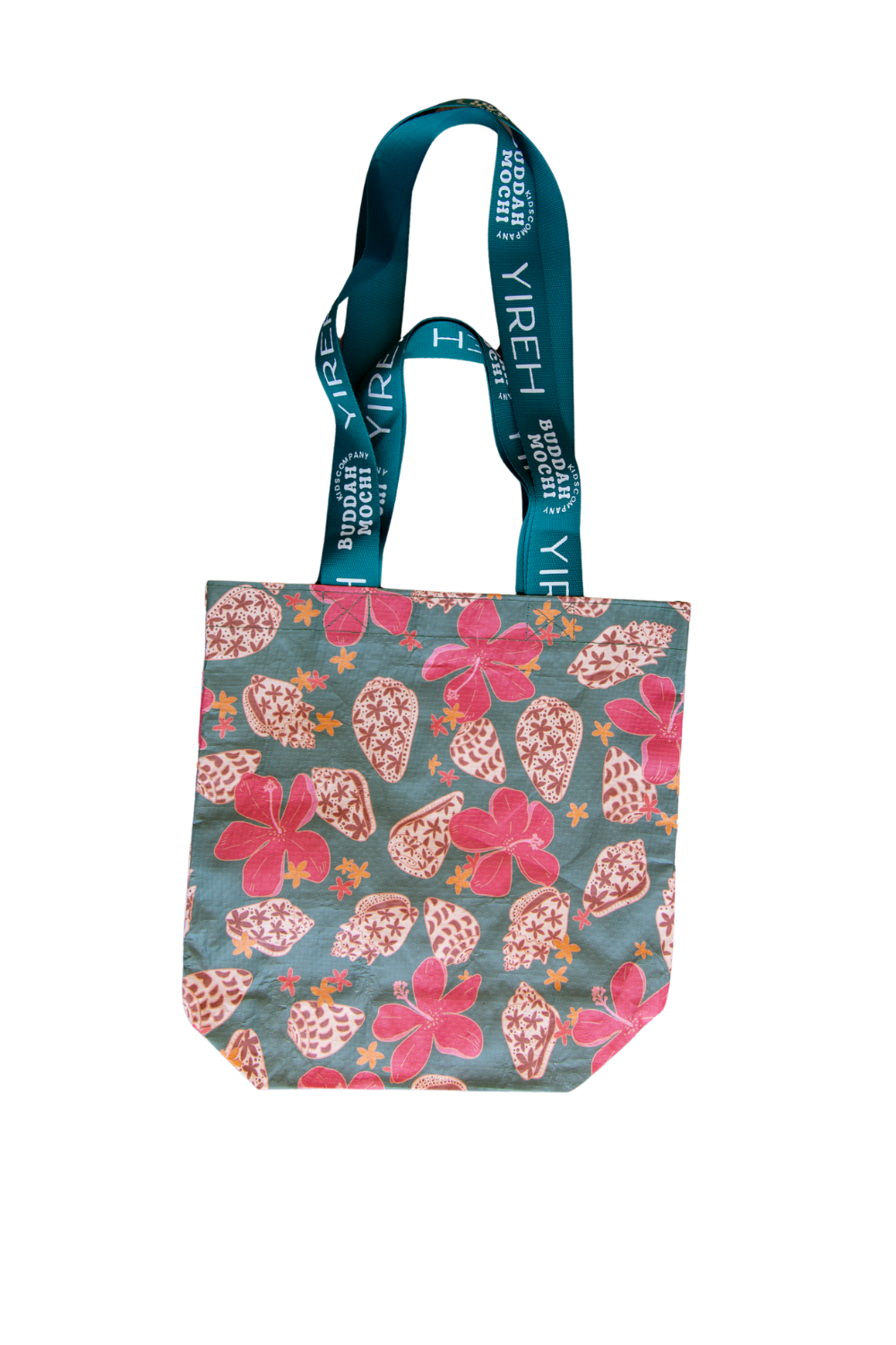 teal buddah mochi manini bag with shell & pua print and dark teal straps. 