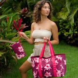 woman carrying wine colored neoprene tote bag with thick straps and detachable pouch with orchid print
