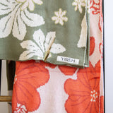 orange cotton throw blanket with floral print
