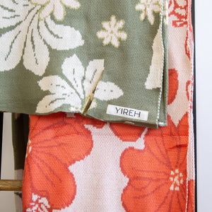 orange cotton throw blanket with floral print