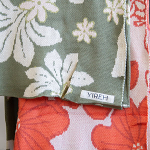green cotton throw blanket with naupaka print