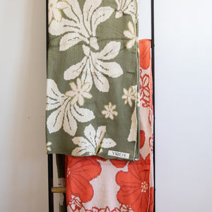 orange cotton throw blanket with floral print