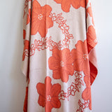 orange cotton throw blanket with floral print