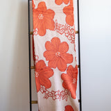 orange cotton throw blanket with floral print