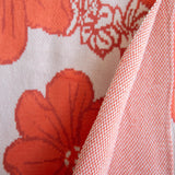 orange cotton throw blanket with floral print