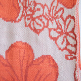 orange cotton throw blanket with floral print