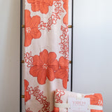 orange cotton throw blanket with floral print