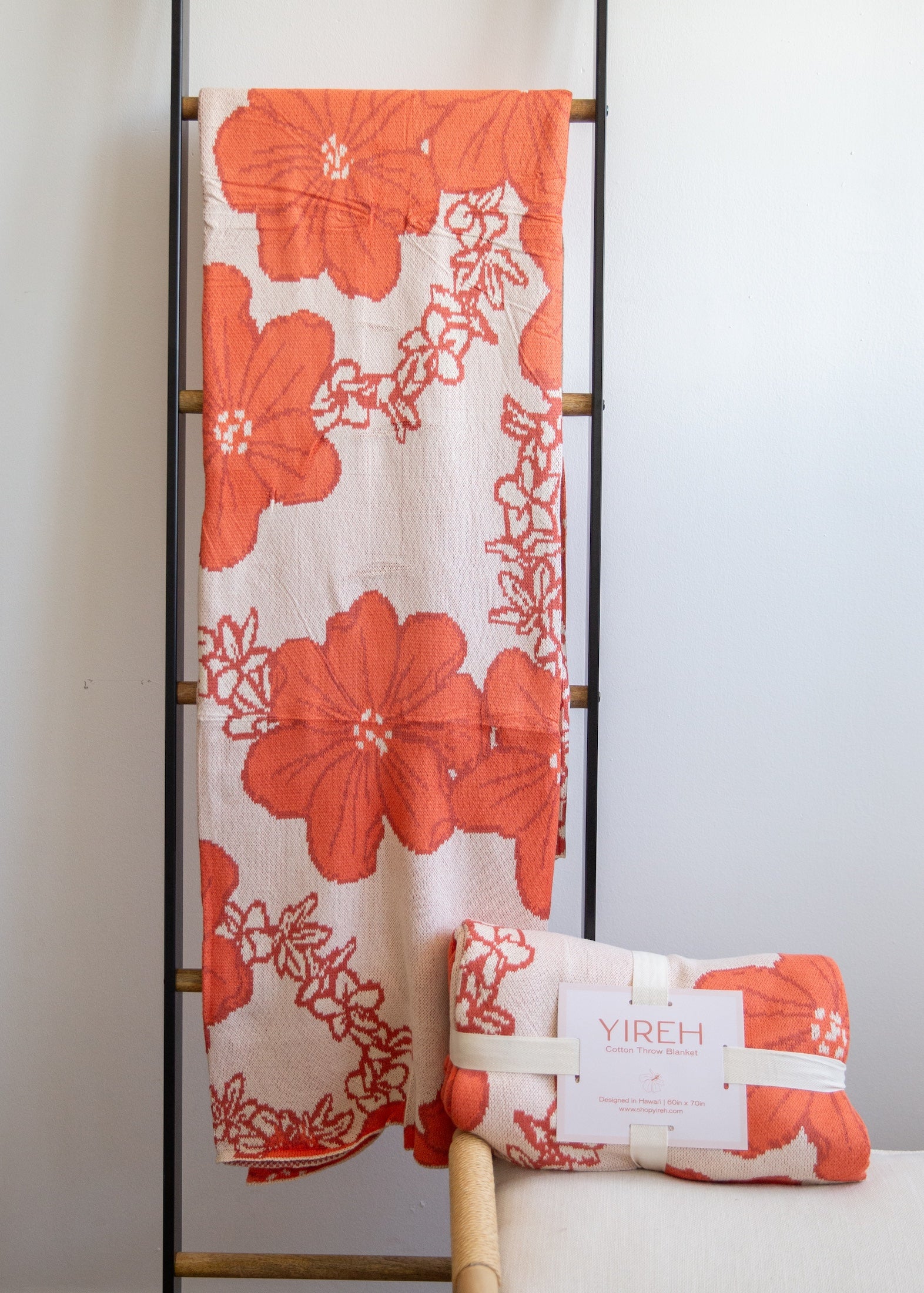 orange cotton throw blanket with floral print