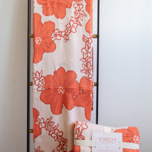 orange cotton throw blanket with floral print