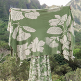 green woven cotton blanket with native hawaiian flowers 