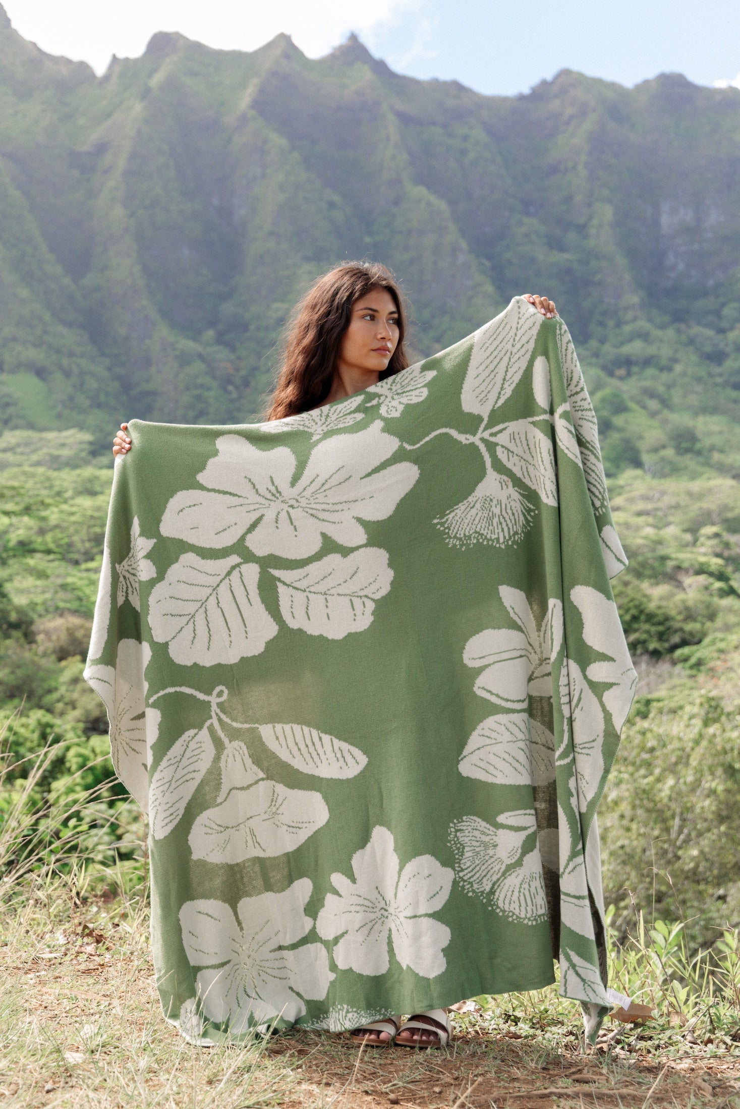 green woven cotton blanket with native hawaiian flowers 