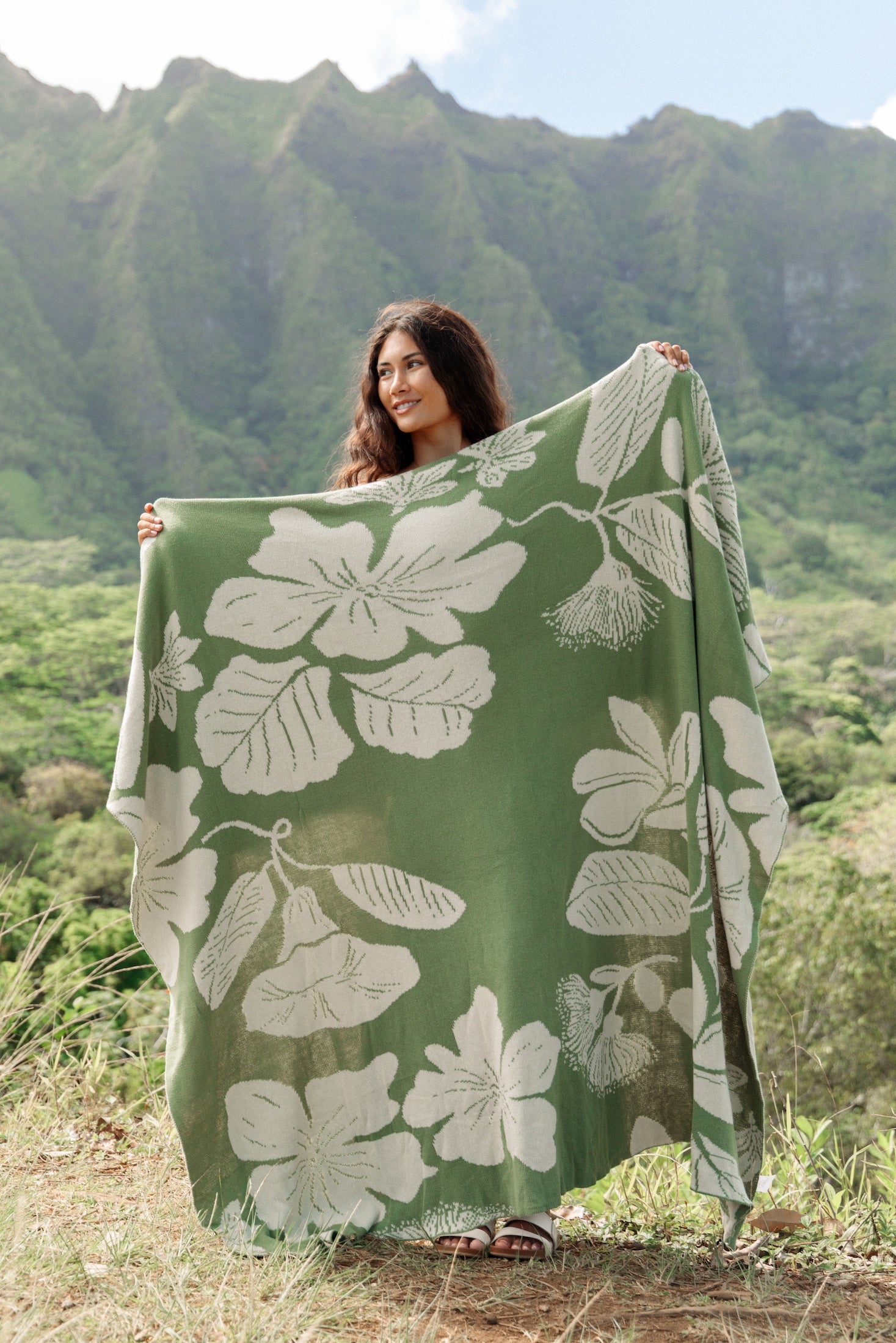 green woven cotton blanket with native hawaiian flowers 