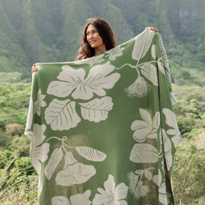 green woven cotton blanket with native hawaiian flowers 
